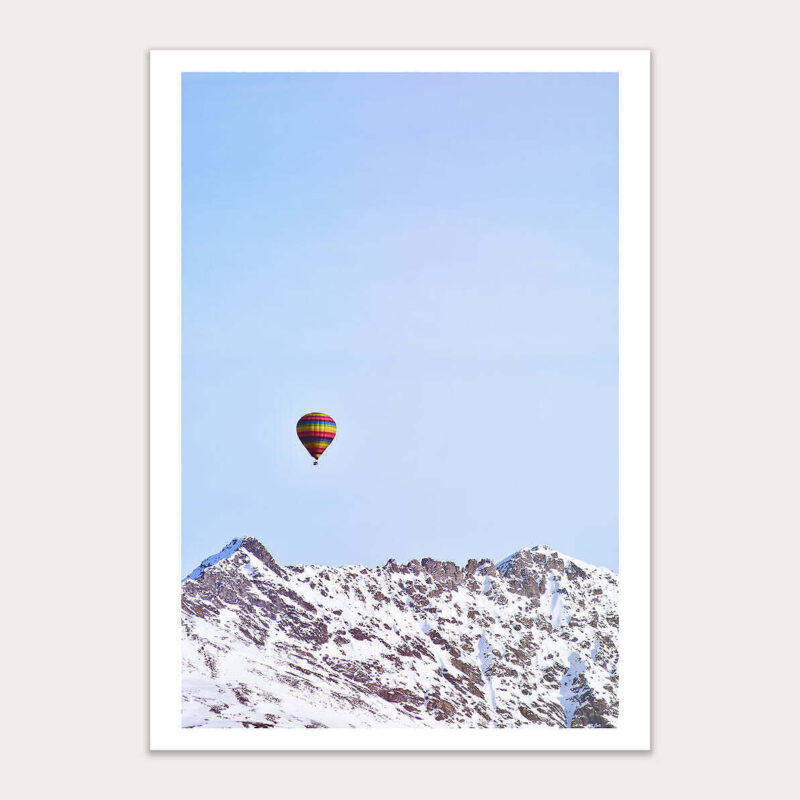 Hot Air Balloon Over Mountain Peaks
