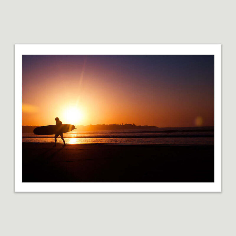 Surfer on Dawn Sunlight